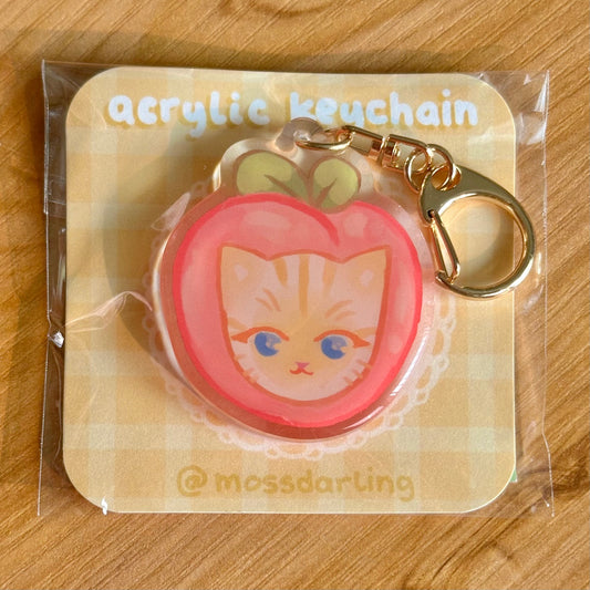 Peach cat acrylic keychain
