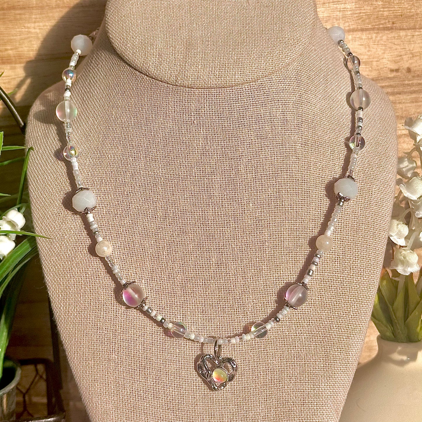 white semi-precious beaded necklace with heart pendant