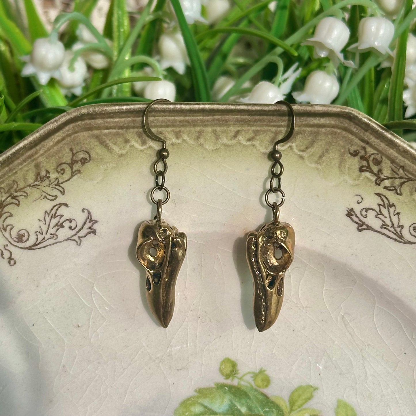 brass raven skull earrings